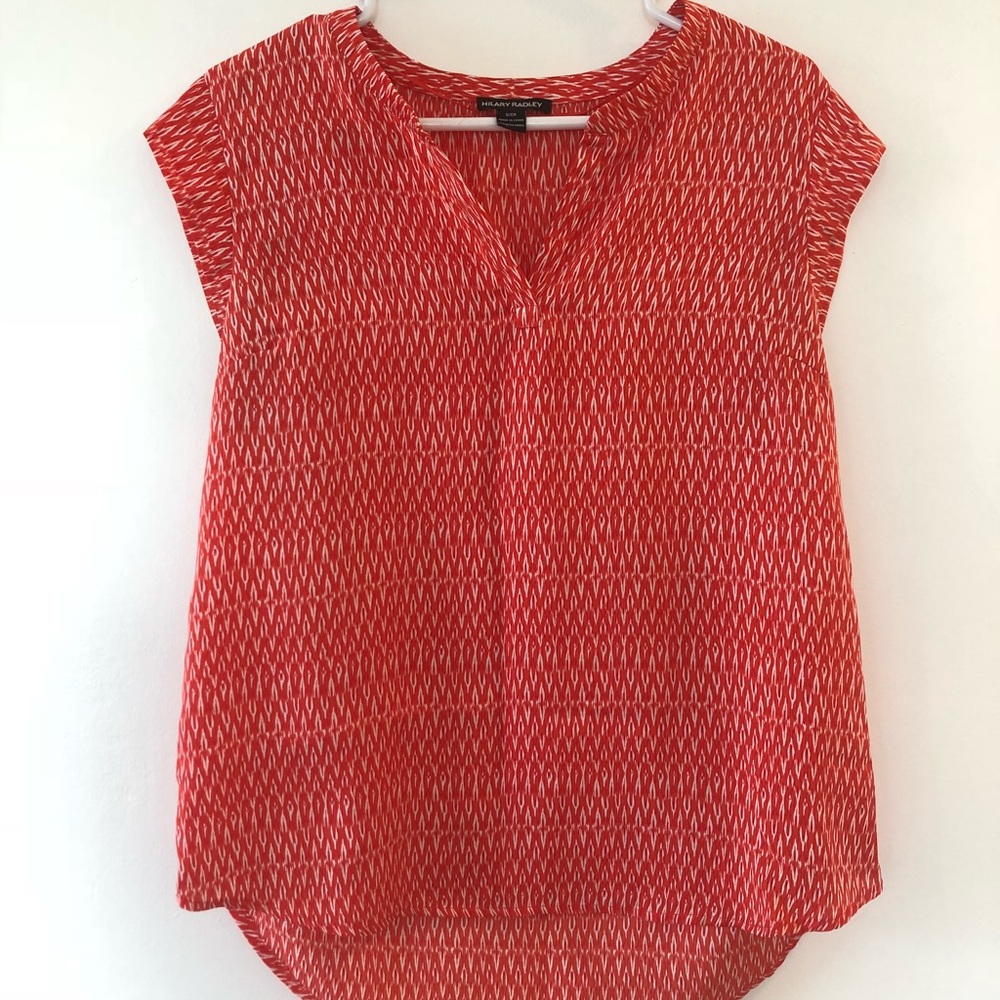 Women’s short sleeved blouse in coral and white
